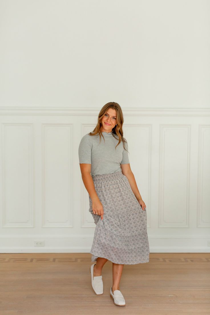 Elevate your closet with a feminine skirt that can be used any season out of the year! The 'Aviva' midi skirt features a chic print, a graceful silhouette, and is fully lined. Pair with a neutral top or sweater, or wear it with the 'Aviva' top for a cohesive set look! 100% Polyester Fully Lined Hand Wash Cold Separately Do Not Bleach Hang or Lay Flat to Dry Low Iron If Needed Model in Cream Height 6' | Wearing Size Medium Wearing the 'Winslow' Button Down Ribbed Cardigan in Oatmeal with the 'Avi Flowy Lined Maxi Skirt For Day Out, Feminine Flowy Maxi Skirt With Lined Skirt, Feminine Flowy Lined Maxi Skirt, Feminine Lined Maxi Skirt For Day Out, Feminine Flowy Pleated Maxi Skirt, Feminine Midi Skirt For Day Out, Elegant Flowy Maxi Skirt For Day Out, Modest Gathered Maxi Skirt For Spring, Modest Midi Flowy Skirt