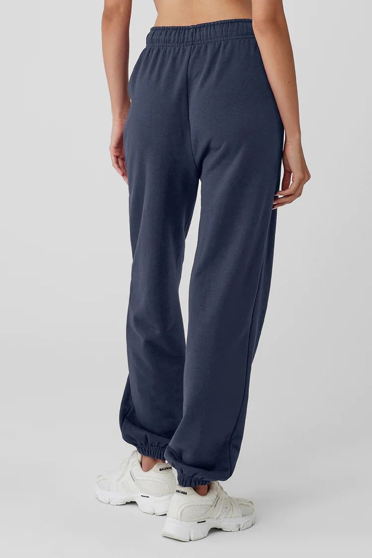 Accolade Sweatpant - Navy | Alo Yoga Comfortable Pull-on Sweatpants For Fall, Leisure Cotton Pants With Pull-on Style, Fall Leisure Sweatpants With Elastic Waistband, Baggy Sporty Sweats For Loungewear, Sporty Relaxed Fit Wide Leg Sweats, Cozy Relaxed Fit Solid Color Sweats, Sporty Wide-leg Sweats With Relaxed Fit, Sporty Wide Leg Relaxed Fit Sweats, Sporty Wide Leg Sweats With Relaxed Fit