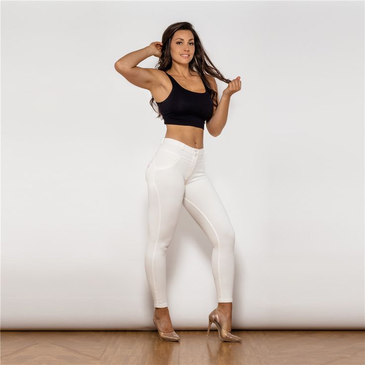 Achieve the perfect combination of comfort, style, and performance with our Women&apos;s Cotton Shaping Leggings. These leggings are crafted from a high-quality blend of 80% cotton and 20% elastane, offering both softness and flexibility. Designed for yoga and fitness, these leggings feature shaping and butt lifting capabilities, providing a flattering silhouette while keeping you supported throughout your workout.

The tight fit and 360-degree elasticity ensure a snug, comfortable feel, allowing for full freedom of movement. With their all-match solid color design, these leggings are versatile enough to wear for various sports activities or casual outings. Available in white and a wide range of sizes from XXS to XXXL, these leggings cater to all body types.

Key Features:

 	Made from 80% Hip Style, Color Image, White Leggings, Cotton Leggings, Seamless Leggings, Weaving Techniques, Athletic Women, Short Girls, Workout Leggings