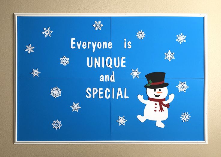 there is a snowman with a hat and scarf on it's face that says everyone is unique and special