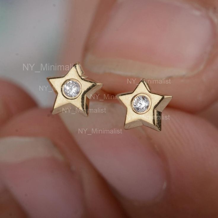 Small Star Stud Earrings Genuine SI G-H Solitaire Diamond Studs 14K Solid Gold Celestial Star Earrings Minimalist Birthday Gift For Her * SKU: ST00240_14876 (SGT00604) * Made to Order:-  * Gold Purity: 14K Solid Yellow Gold (stamped) * Custom Gold Color: Rose Gold, Yellow Gold, White Gold * Custom Gold Purity: 10K/14K/18K (Charges Apply) * Diamond 100% Genuine Diamond * Diamond Weight: 0.07 ct. * Diamond Color: G-H * Diamond Clarity: SI1- SI2 * Diamond Cut: Brilliant Cut (Excellent) Product Meas 14k Gold Star-shaped White Gold Earrings, 14k White Gold Star Earrings, Fine Jewelry Star-shaped Earrings For Anniversary, Star-shaped Fine Jewelry Earrings For Anniversary, Fine Jewelry Star Earrings For Anniversary, Rose Gold Star Earrings For Anniversary, Anniversary Jewelry With Star-shaped Matching Earrings, Anniversary Jewelry With Matching Star Earrings, Anniversary Star-shaped Jewelry With Matching Earrings