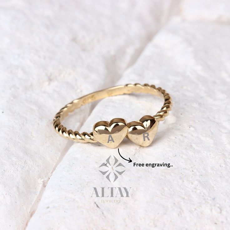 ABOUT PRODUCT  This 14K Gold Heart Ring is suitable gift for girlfriend, mom and her. You can even buy as a birthday gift for your friends or anniversary gifts, If you want to add a special note we can write for you and put to inside of package. We manufacture our jewelry pieces with carefully and after production we double checking in quality control department. Our main idea is keep our items for daily wearing especially for minimalist jewelry pieces. 14K Gold Heart Ring, Tiny Hearts Stacking Ring, Double Heart Dainty Ring, Custom Heart Ring, Personalized Initial Ring, Promise Love Band, Gift For Her, Christmas, New Year, Mothers Day, Valentines Day, Anniversary, Birthday Gift. ITEM DETAILS Material: 14K Gold Approx: 1.50 gram Available colors: Gold, Rose Gold, White Gold. Available Size Heart Cut Ring For Valentine's Day Gift, Double Heart Birthstone Rings For Gifts, Personalized Yellow Gold Heart Ring In Sterling Silver, Personalized Adjustable Heart Cut Ring, Adjustable Heart Ring For Valentine's Day Anniversary, Personalized Heart Ring For Valentine's Day Promise, Personalized Heart Promise Ring For Valentine's Day, Valentine's Day Gift Couple Rings In White Gold, Personalized Heart Ring For Valentine's Day