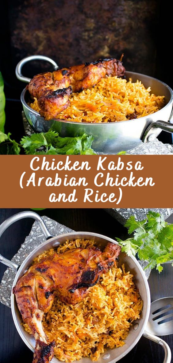 chicken kabab and rice in a pan on top of a table with garnish