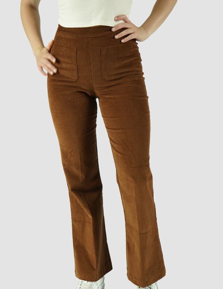 Snag these high-waisted Corey corduroy pants with back patch pockets for a look that never goes out of style! With your choice of chocolate and classic black, no matter which you choose, you're sure to love the comfy, soft feel and throwback style. Dress it up or down, you can do it all in the Corey corduroy pants. Model is wearing a small 95% Cotton 5% Spandex Imported Machine wash cold, with like colors No bleach Tumble dry low Low iron if needed Pants Model, The Comfy, Low Low, Brown Pants, Low Iron, Back Patch, Corduroy Pants, Out Of Style, Style Dress