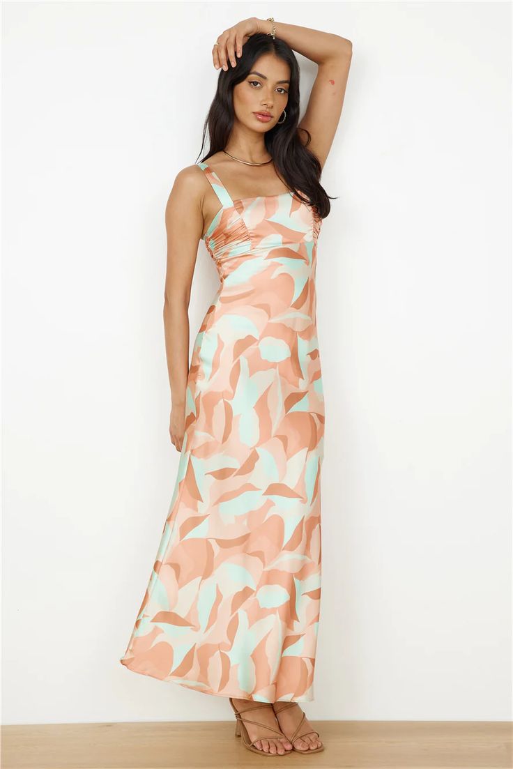 Get in touch with the earth that surrounds you and fall in love with your destination in the Earth Sign Dress. Pair this dress with white heels and gold adornments for an elevated look. Sign Dress, Plunge Neck Maxi Dress, Bandeau Maxi Dress, White Slip Dress, Travel Outfits, Earth Signs, Crop Top Tees, Dress Orange, Runway Trends