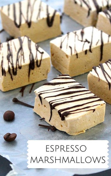 chocolate and marshmallows are arranged on a sheet of wax paper with the words espresso marshmallows