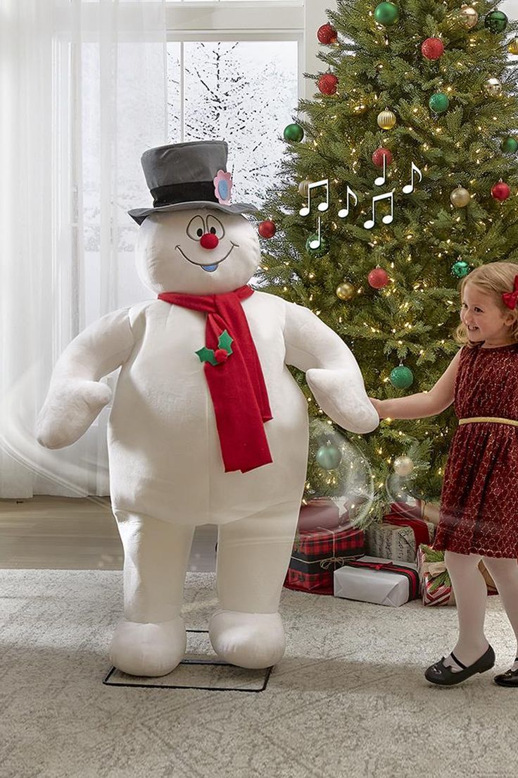 Standing 50 inches tall, this plush animatronic singing and dancing Frosty the Snowman is based on the classic 1969 cartoon Christmas special. Christmas Animatronics, Half Christmas Tree, Holiday Inflatables, Hammacher Schlemmer, Luau Theme, Frosty The Snowman, Cartoon Christmas, Frosty The Snowmen, Beautiful Christmas Trees