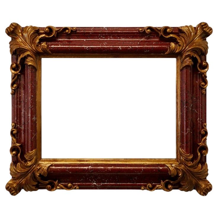 an old red and gold frame on a white background