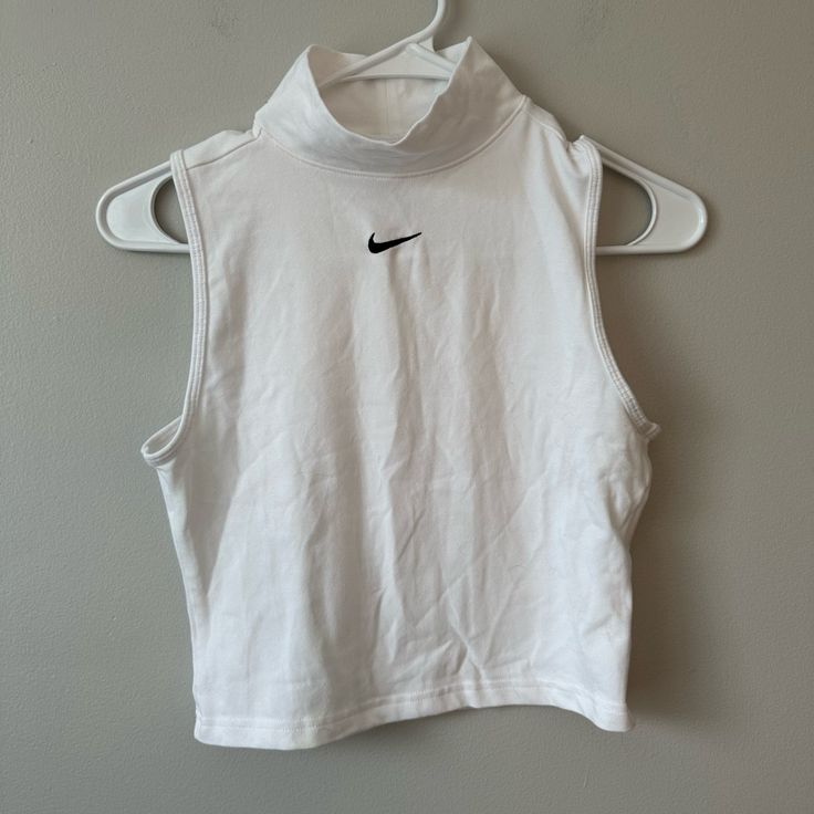 Never Worn. Brand New From Nordstrom Nike Trendy Top For Spring, Nike Sleeveless Tops For Streetwear, Nike Sports Crop Top, Nike Sleeveless Streetwear Tops, White Casual Nike Tank Top, Casual White Nike Tank Top, Nike Basic Tops For Spring, Trendy Nike Stretch Tops, Trendy Stretch Nike Tops