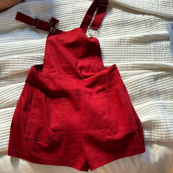 Nwt Red Short Romper Casual Red Solid Color Jumpsuits And Rompers, Casual Red Jumpsuits And Rompers, Casual Red Jumpsuit And Romper, Casual Red Cotton Jumpsuits And Rompers, Red Sleeveless Overalls For Summer, Fitted Red Overalls, Red Sleeveless Summer Overalls, Red Overall Jumpsuit With Pockets, Red Summer Overalls With Pockets