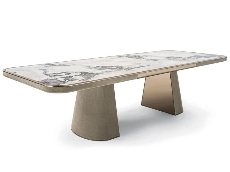 a white marble table sitting on top of a wooden base