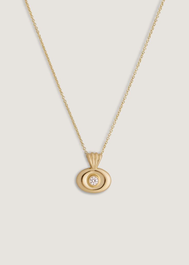 Designed by tastemaker and jewelry collector Rachel Nosco, the Eternal Summer collection features transitional pieces made to be worn through change, and cherished for generations to come.Let this piece take you to San Raphael in the South of France. Featuring a 0.19 carat lab created round diamond, wear it on your travels stacked with a herringbone chain. Pendant Details & Specs: 14k solid gold—always Pendant weight: 3.1g Hollow pendant Pendant measurements: 17mm x 14.7mm Lab created diamond Ca Timeless Design Jewelry Gift, Minimalist Timeless Design Jewelry As Gift, Oval Diamond Necklace With Polished Finish For Gifts, Modern Diamond Necklace For Gifts, Timeless Everyday Elegance Jewelry With Polished Finish, Modern Round Diamond Necklace For Gifts, Modern Round Diamond Necklace Gift, Timeless 14k Gold Necklace, Modern Round Everyday Luxury Necklaces