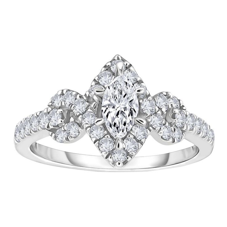 a white gold ring with an oval cut diamond surrounded by smaller round diamonds on the band