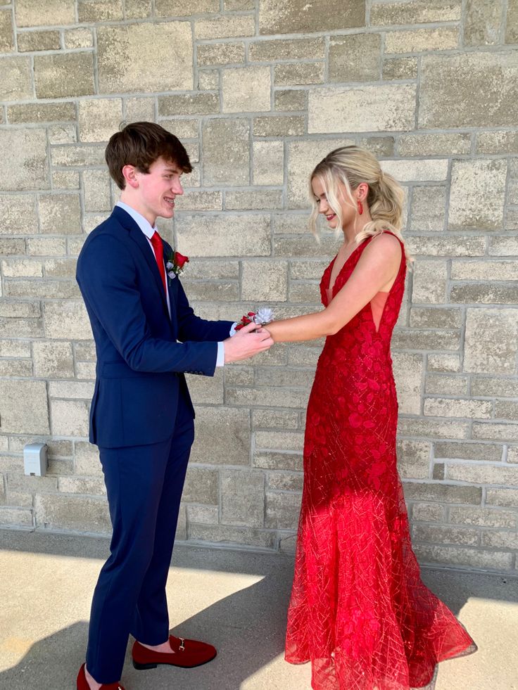 #prom #red #navy #corsage #dress Blue Suit Red Dress Couple, Red White And Blue Prom Dress, Red And Blue Prom Couple, Red Dress Navy Suit Couple, Red White And Blue Prom Couple, Navy Suit Red Dress, Red Prom Looks Couple, Prom Couples Red Dress, Navy Blue Suit Prom Couple