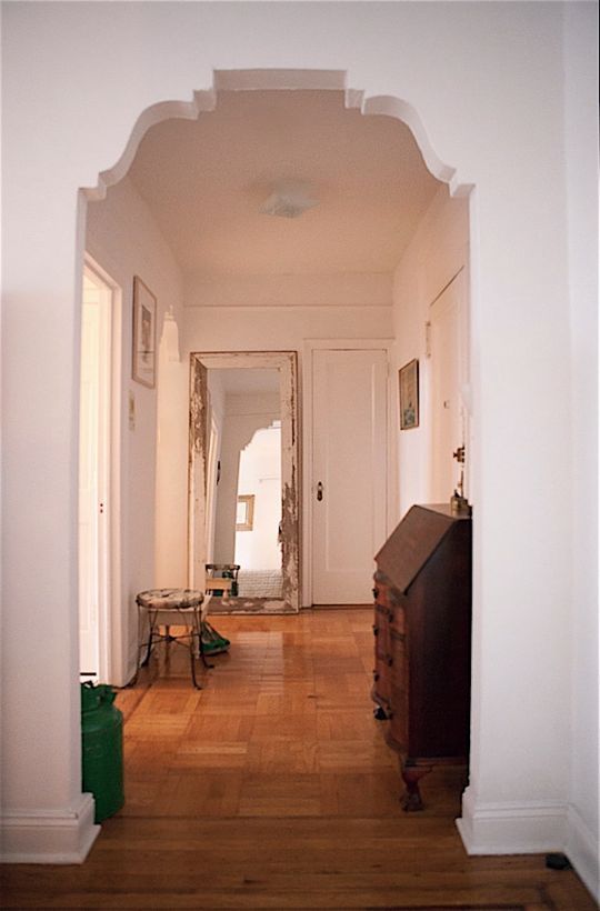 the hallway is clean and ready for us to use as an entrance way in this house