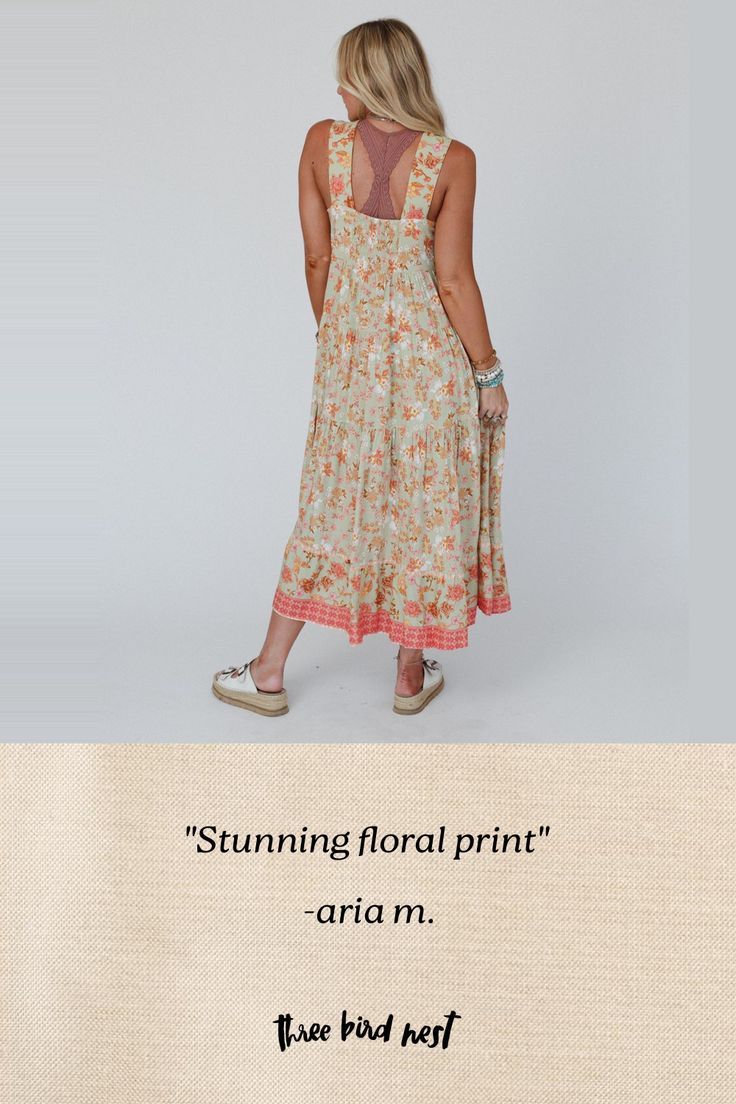 Whether you're dressing up for a special event or just want to add some boho flair to your everyday look, the Paradise Sunrise Maxi Dress is sure to make a statement! Lightweight, flowy, woven fabric with an eye - catching floral print Flattering empire maxi dress silhouette Square neckline and backline with thick shoulder straps Gathered tiers for added boho style Bottom hem with so pretty floral border print Pair with: Eye Of The Sun Padded Bralette, Sunlit Sands Panama Hat and Turquoise Casca Beige Flowy Maxi Dress For Spring, Flowy Printed Midi Dress For Garden Party, Flowy Boho Dress With Boho Print For Brunch, Flowy Boho Print Dress For Spring, Spring Boho Print Flowy Dress, Flowy Maxi Dress For Spring And Summer, Spring Boho Dress With Floral Print For Garden Party, Bohemian Sleeveless Sundress For Brunch, Flowy Boho Dress For Spring Garden Party