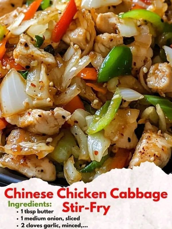 chinese chicken cabbage stir fry in a black bowl