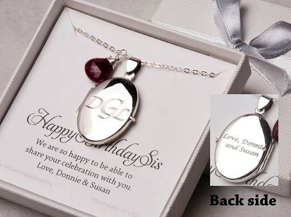 An engraved locket necklace:1. One shining, highly polished sterling silver locket (blank, engraved on one side or both sides with initials, greeting words, or bible verses).  Two photos can be inserted into the locket. Photo insertion service is also available at $14 per photo. 2. a wire-wrapped gemstone3. (free as a courtesy) an optional customized message card, laser-printed on heavy weight card stock and with a beautiful layout.4. a shining sterling silver cable chain closed with a lobster c Elegant Oval Pendant Locket Necklace As A Gift, Elegant Oval Pendant Locket Necklace Gift, Silver Oval Jewelry For Personalized Gift, Elegant Engraved Jewelry For Anniversary Gift, Elegant Jewelry With Engraving Option For Anniversary, Silver Locket Jewelry For Birthday Gift, Personalized Oval Pendant Necklace For Anniversary, Personalized Anniversary Necklace With Oval Pendant, Hallmarked Oval Pendant Locket Necklace For Wedding