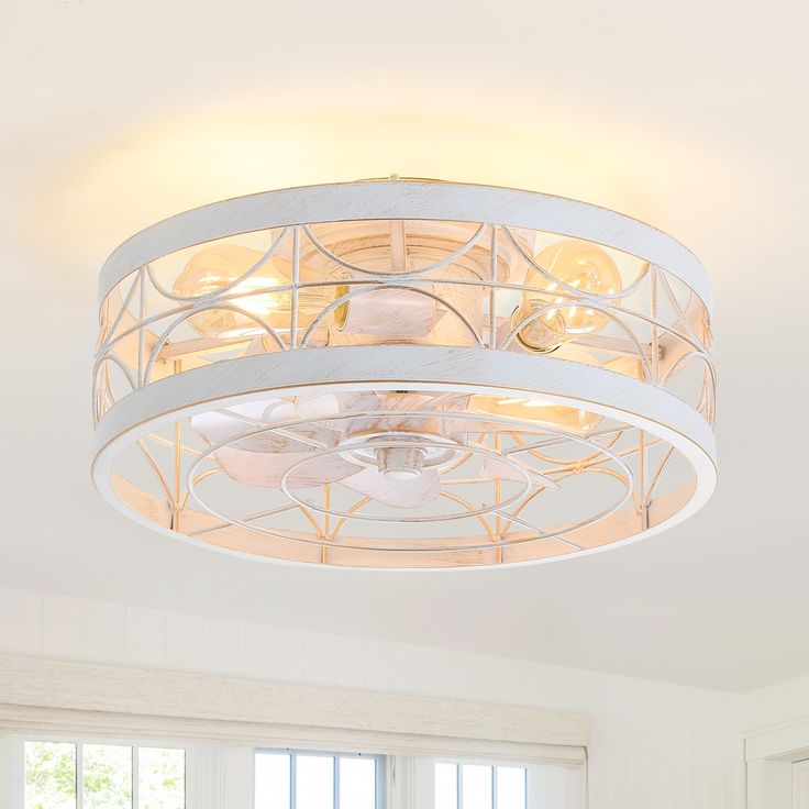 a living room with a round light fixture