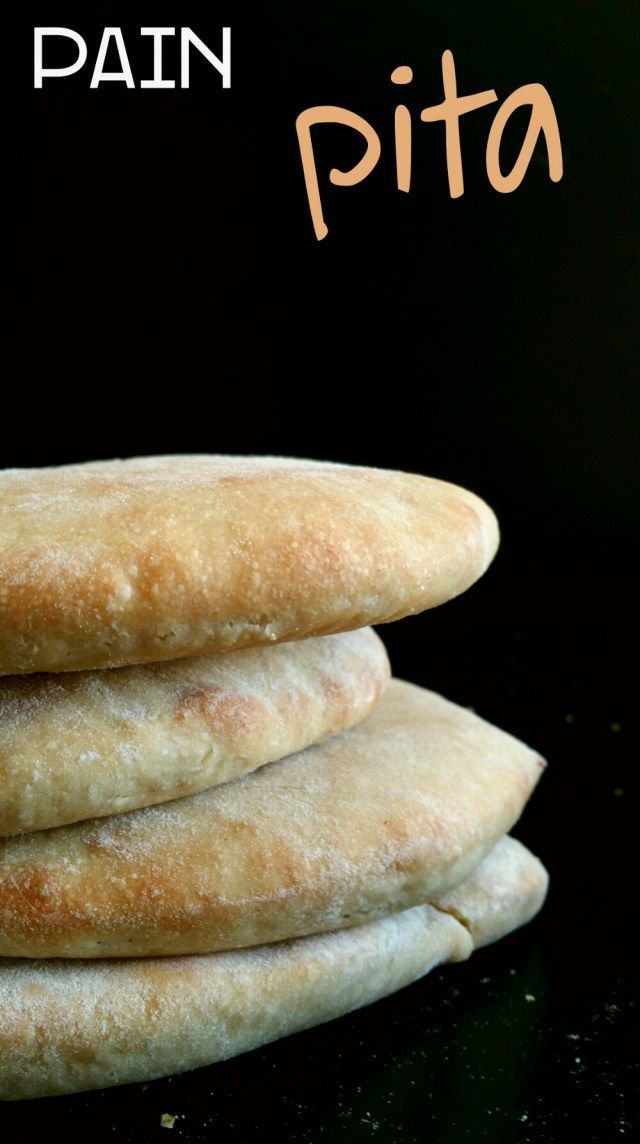 three pita breads stacked on top of each other in front of a black background