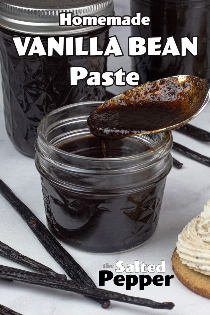 homemade vanilla bean paste is being spooned into a jar