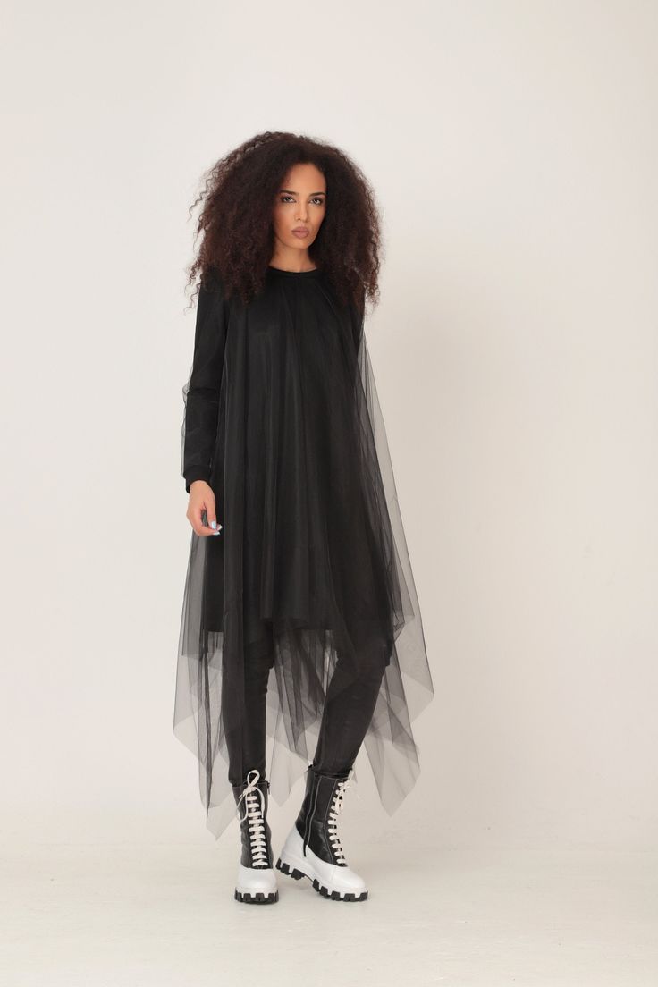 Black Sheer Dress, Black Tulle Dress, Plus Size Tulle Dress OVERSIZED MIDI DRESS IN ASYMMETRIC RICH TULLE NET LAYERS GARMENT FEATURES: * A truly stunning design with a WOW-effect when moving * Asymmetric rich tulle layers of soft net * Fully lined with soft cotton jersey * Ribbed classic crew neckline * Long jersey sleeves in a sweatshirt pattern, covered in tulle * Light weighted and comfy to wear * Part of our ADEPTT PREMIUM edit SIZING & FITTING: Model is 172cm tall and wears size S. This Sheer Dresses For Winter Party, Sheer Winter Party Dresses, Sheer Tulle Evening Dress With Long Sleeves, Long Sleeve Tulle Dress For Cocktail, Black Tulle Dress For Party, Long Sleeve Dresses With Mesh Sleeves And Tulle, Tulle Maxi Dress With Sheer Sleeves For Party, Tulle Dress With Long Mesh Sleeves, Long Sleeve Tulle Dresses With Mesh Sleeves