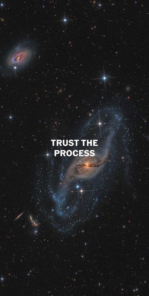 the words trust the process are in front of an image of two spiral galaxys