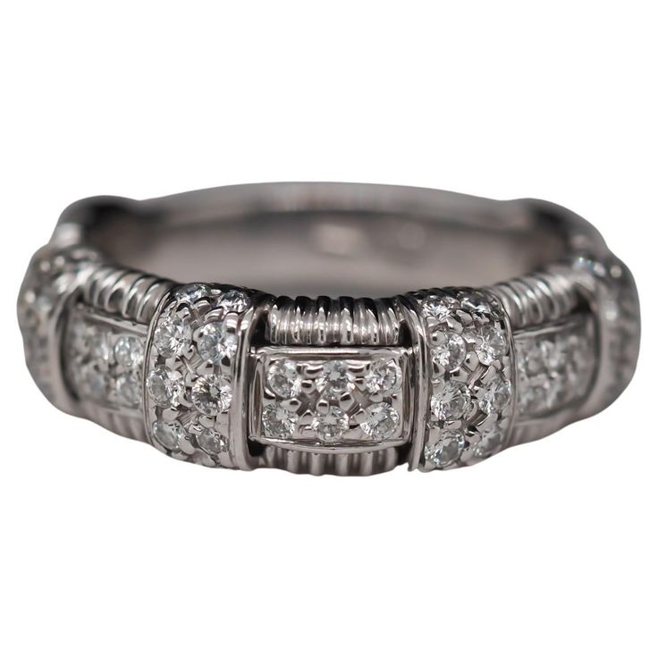 Year: 2000s Item Details: Ring Size: 5.5 Metal Type: 18k white gold [Hallmarked, and Tested] Weight: 6.0 grams Diamond Details: .50ct, total weight. F Color, VS Clarity, Round Brilliant, Natural Diamonds Band Width: 4mm Condition: Excellent Price: 2450 Woven Ring, Roberto Coin, Signet Ring, Diamond Bands, Round Brilliant, Basket Weaving, Types Of Metal, Natural Diamonds, Metallica