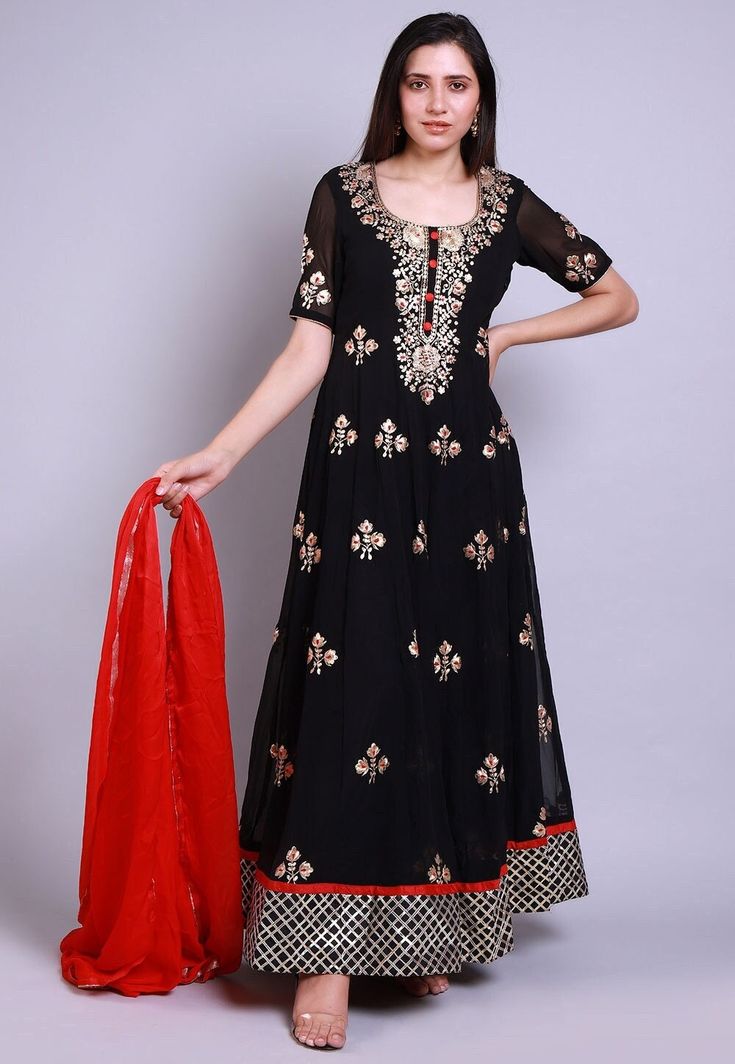 Faux Georgette Abaya Style Kameez in Black. This Readymade attire with Shantoon Lining is Enhanced with Buttons, Resham, Zari, Pita and Patch Border Work and is Crafted in Square Neck and Half Sleeve.Available with a Lycra Leggings in Black and a Faux Chiffon Dupatta in Red. For sizes 46 to 66, a Churidar will be available instead of the leggings. The Kameez and Bottom Lengths are 55 and 45 inches respectivelyDo note: Accessories shown in the image are for presentation purposes only and length m Elegant Black Floor-length Palazzo Set, Black Floor-length Palazzo Set For Party, Formal Festive Abaya, Festive Formal Abaya, Black Floor-length Palazzo Set For Festive Occasions, Black Palazzo Set With Sheer Dupatta, Black Floor-length Festive Palazzo Set, Festive Black Floor-length Palazzo Set, Black Anarkali Palazzo Set With Sheer Dupatta