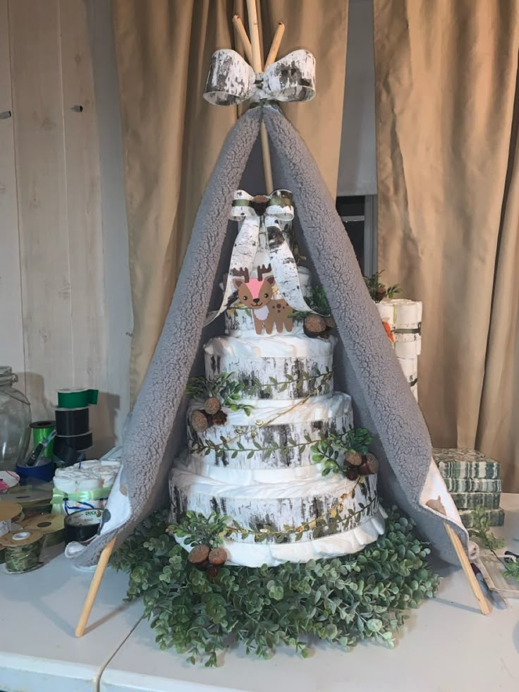 a wedding cake made to look like a tent