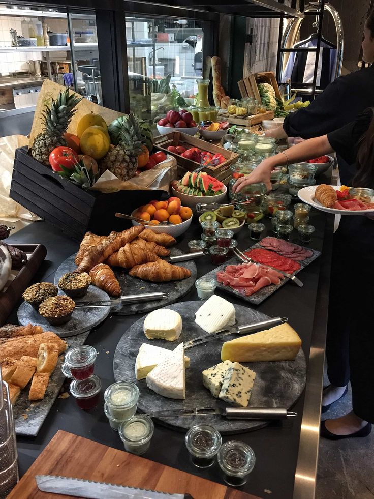 a buffet table filled with different types of food