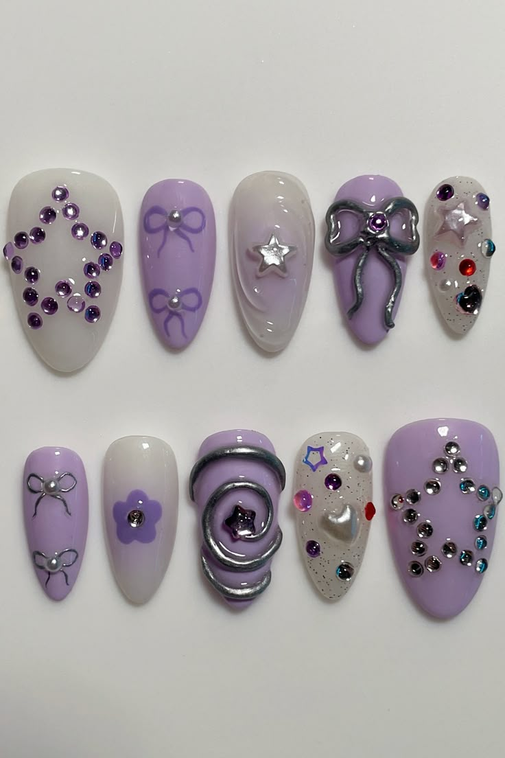 olivia rodrigo, olivia rodrigo aesthetic, sour nails, sour album nails, olivia rodrigo nails, guts nails, nails inspired by guts, olivia rodrigo guts, guts aesthetic, olivia rodrigo aesthetic, lilac nails, olivia rodrigo purple nails Purple Nail Art Designs Acrylics, Nail Art Purple Designs, Cool Purple Nails, Girly Gel Nails, Nail Bow Designs, Simple Nails With Charms, Purple Cute Nails, Purple Gel X Nails, Nails Asthetics