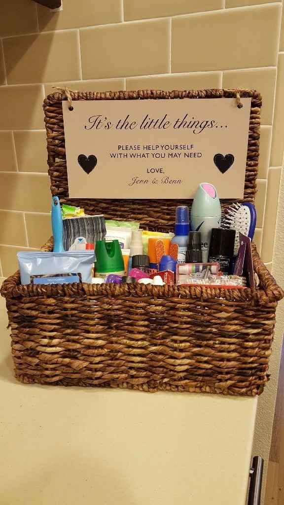 a basket with personal care items in it and a sign on the top that says it's the little things