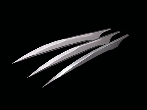 three scissors are shown on a black background