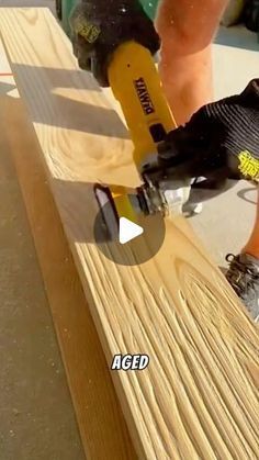 a skateboarder is doing tricks on a wooden ramp