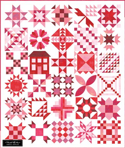 a red and white quilt with many different designs