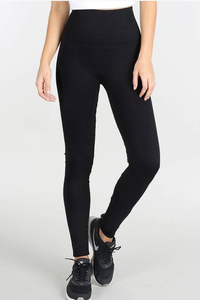 Niki High Waist Band Black Leggings. These leggings are a high quality opaque black legging featuring a high waist band that will hold everything in! We love these!!! One Size 92% Nylon, 8% Spandex Made in USA Versatile High Waist Black Tights, Versatile High-waist Black Tights, Micro-elastic Black Yoga Pants, High-rise Elastane Leggings With Elastic Waistband, Black Micro-elastic Pants, Stretch Leggings With Elastic Waistband For Training, High Waist Black Leggings For Pilates, Black Tight Leggings For Training, Black High Waist Athleisure Leggings