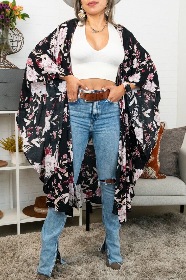 Flutter into fashion with our Floral Butterfly Sleeve Kimono! Featuring a beautiful butterfly print and flowy sleeves, this kimono is the perfect addition to any outfit. Soar with style and embrace your inner free spirit. Casual Black V-neck Kimono, Flowy V-neck Kimono For Day Out, Casual Spring Cover-up With Kimono Sleeves, Black Stretch Cover-up For Spring, Black Stretch Spring Cover-up, Flowy Spring Loungewear Cover-up, Black Cover-up For Spring Day Out, Black Cover-up For Day Out In Spring, Spring Black Long Sleeve Cover-up