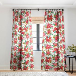 the curtains are open and ready to be hung in front of an open window with flowers on it