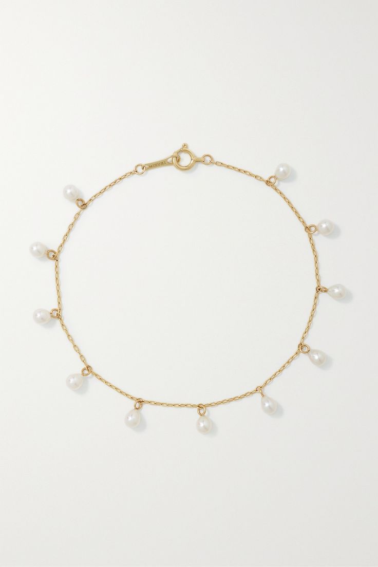 Mizuki Goltz believes that jewelry is an expression of personal style - this bracelet is perfect for those who prefer the classics. It's made from 14-karat gold and strung with 11 dangling Akoya pearls. Adjust the chain to a comfortable fit. Yellow Gold Single Strand Bracelet, 14k White Gold Bracelets For Everyday Luxury, 14k Yellow Gold Jewelry With Pearl Charm, Everyday Luxury 14k White Gold Bracelets, Classic Single Strand 14k Gold Bracelet, Formal Yellow Gold Bracelets With Pearl Charm, 14k Yellow Gold Pearl Bracelet, Classic 14k Gold Single Strand Bracelet, Formal Yellow Gold Bracelet With Pearl Charm