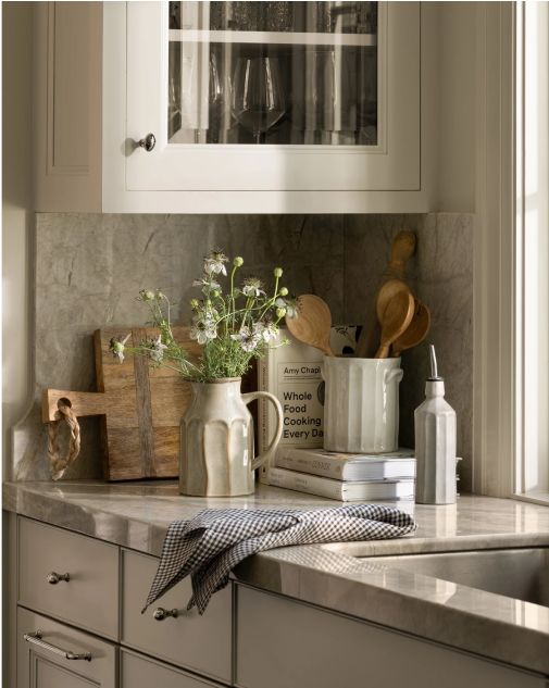 the kitchen counter is clean and ready to be used as a place for cooking utensils