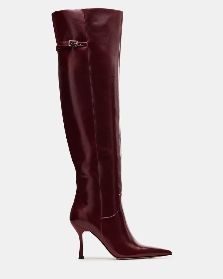 The DAWN boot features a pointed toe and knee-high design, perfect for adding a touch of sophistication to any outfit. With a comfortable heel, these boots are both stylish and practical. Elevate your wardrobe with these sleek and versatile boots. 3.5 inch heel height Size 6 measurements: 16 inch shaft circumference, 20 inch shaft height Size 8 measurements: 17.5 inch shaft circumference, 21 inch shaft height Size 10 measurements: 18.5 inch shaft circumference, 22 inch shaft height Vegan leather Styling Knee High Boots Outfit Ideas, Wine Boots, Burgundy Knee High Boots, 25 Birthday, Fall Heels, Thrift Inspo, Fall 24, High Design, Leather Socks