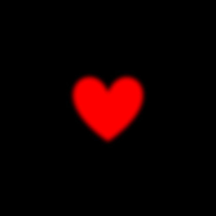 a red heart on a black background