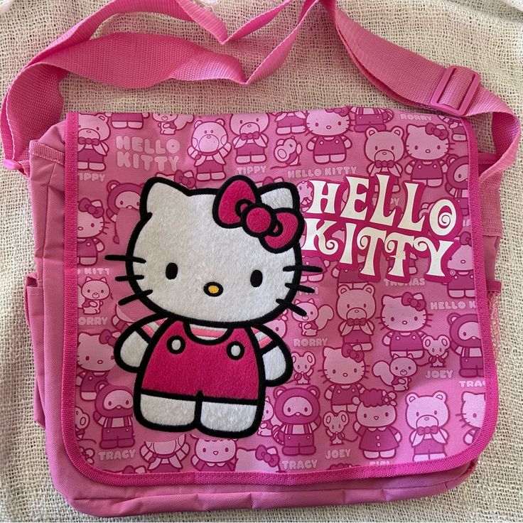 I’ve Had This Cute Hello Kitty Bag Put Away For Yearss Now. Never Used Before, Hopefully There’s Someone Out There That Can Give This Adorable Bag Some Use:) It Has A Good Amount Of Pockets. Great For School. Ask Any Questions If You Need To! Y2k Satchel With Adjustable Strap For School, Y2k Style Rectangular Satchel For School, Y2k Style School Satchel With Adjustable Strap, Y2k School Satchel With Adjustable Strap, White Y2k Style School Bag, Rectangular Hello Kitty Shoulder Bag For Everyday Use, Trendy Hello Kitty Print Bag For Back To School, Y2k Bags For Everyday Use And Back To School, White Y2k School Bag