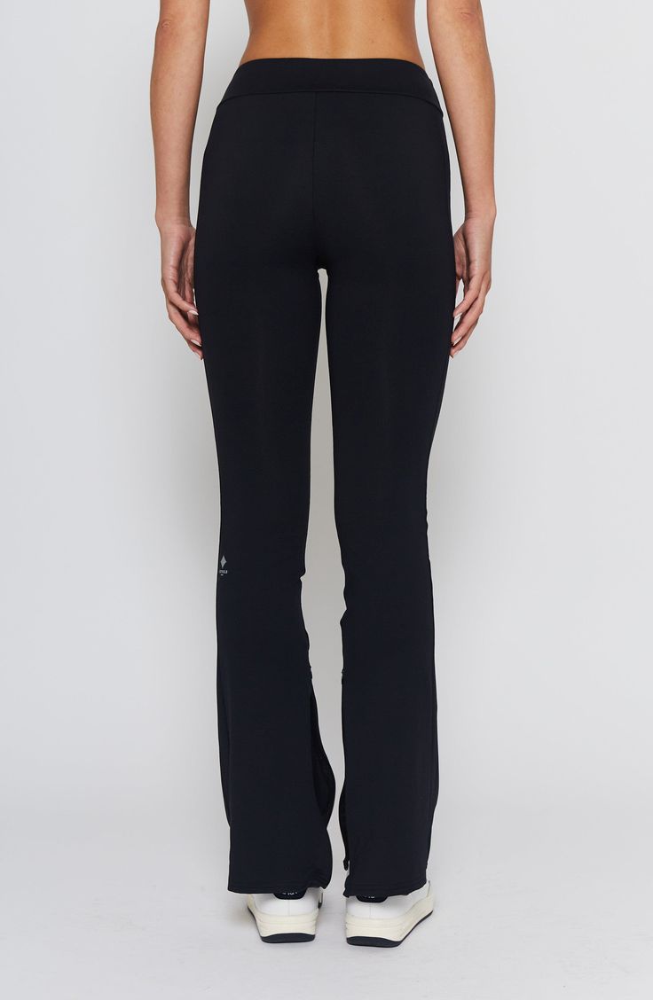 Meet our new split hem panel pants in our signature ultra-soft Italian Jersey. Perfect to practice any sport. Machine wash cold Inseam Length: 32” Sample Size S Model is 5'10 wearing a size S Functional Bottoms With Elastic Side Panels, Sporty Black 4-way Stretch Sweatpants, Sporty Full-length Pants With Elastic Side Panels, Stretch Sweatpants For Training, Functional Go-dry Sweatpants, Athleisure Bottoms With Elastic Side Panels, Sporty High Stretch Straight Leg Activewear, Sporty Straight Leg Bottoms For Pilates, Sporty Straight Leg Pants For Pilates