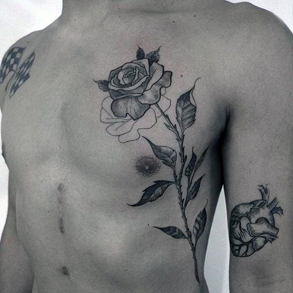 a man with a rose tattoo on his chest