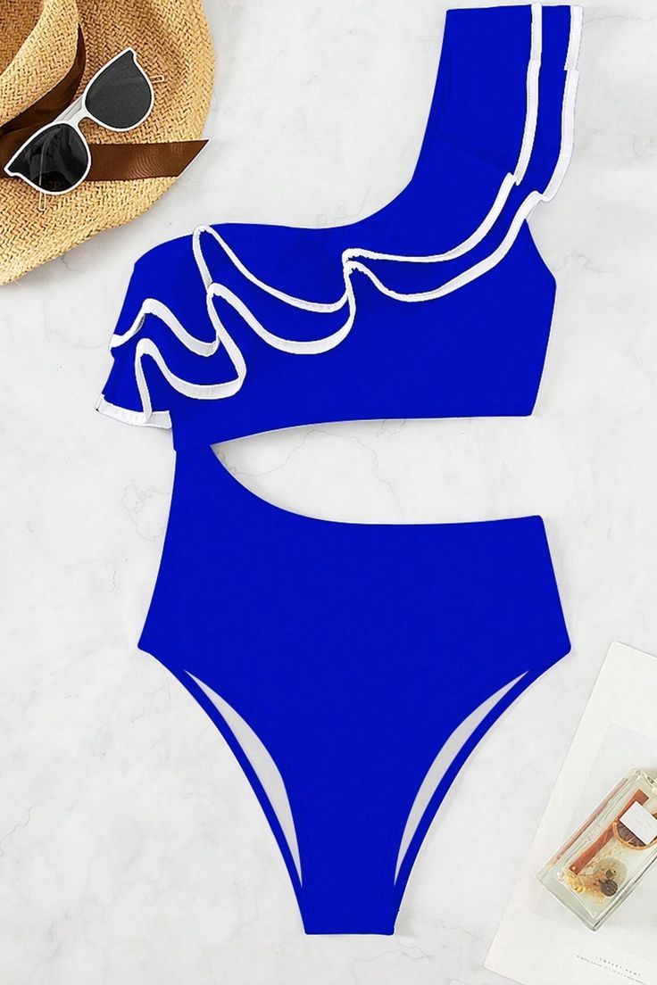 Make waves with our Swim Chicsea Summer Beach One Piece Swimsuit. This elegant swimsuit features a chic colorblock design with a hollow-out waist and ruffle detail for a stylish flair. The asymmetrical neckline adds a modern touch, while the tiered layer enhances the overall look. Designed with a wireless bra and removable padding for customizable comfort, this high-stretch, lined swimsuit ensures a perfect fit. Perfect for your next beach getaway, this one-piece is both fashionable and function Elegant Swimsuit, Swimsuit Sale, Beach Getaway, Make Waves, Asymmetrical Neckline, Beach Getaways, Wireless Bra, Black White Pink