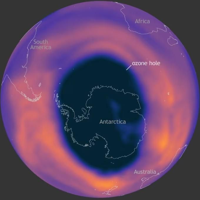 the earth's atmosphere is shown in red and blue, as well as an orange circle