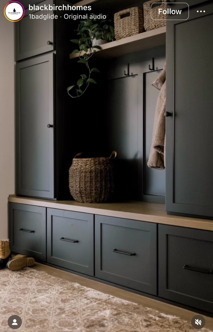 a room with some cupboards and baskets on it