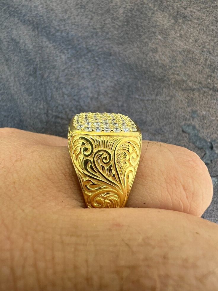 Gorgeous men's square hip hop ring
SOLID 925 sterling silver...finished in 14k yellow gold
Gold is bonded to solid silver underneath so color wont fade or tarnishStamped 925Will never tarnish or turn your hand green!Ring is set with cz on the top
Sides have unique handmade design
These aren't cheap cubic zirconia and look exactly like real diamonds!Ring is 9-10 grams depending on size!Good size...very heavy weight
About 18mm by 18mm...great size for men
Very nice and heavy feelCheck out ou Gold Cubic Zirconia Rectangular Rings, Rectangular Gold Cubic Zirconia Rings, Gold Diamond Ring With Vvs Clarity, Rectangular Shape, Hallmarked Gold Signet Ring With Cubic Zirconia, Gold Cubic Zirconia Hallmarked Signet Ring, Gold Hallmarked Cubic Zirconia Signet Ring, Luxury Yellow Gold Spiritual Men's Ring, Luxury Gold Hammered Men's Ring, Luxury 22k Gold Men's Ring